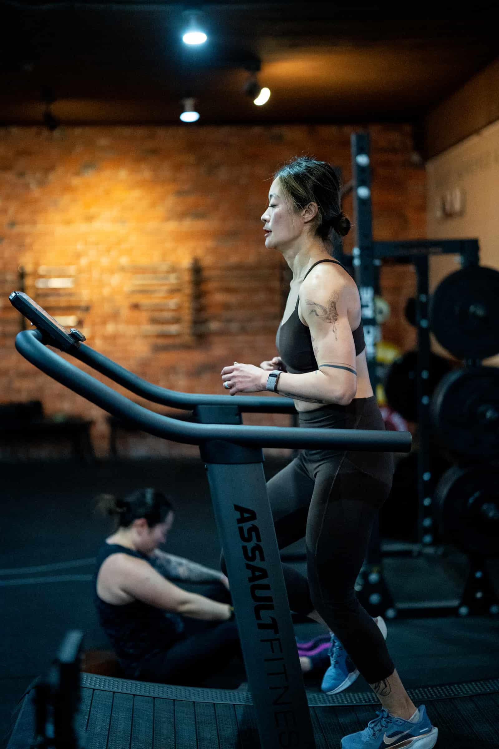 Member running on the AssaultRunner at Persistence Athletics, Belltown Seattle