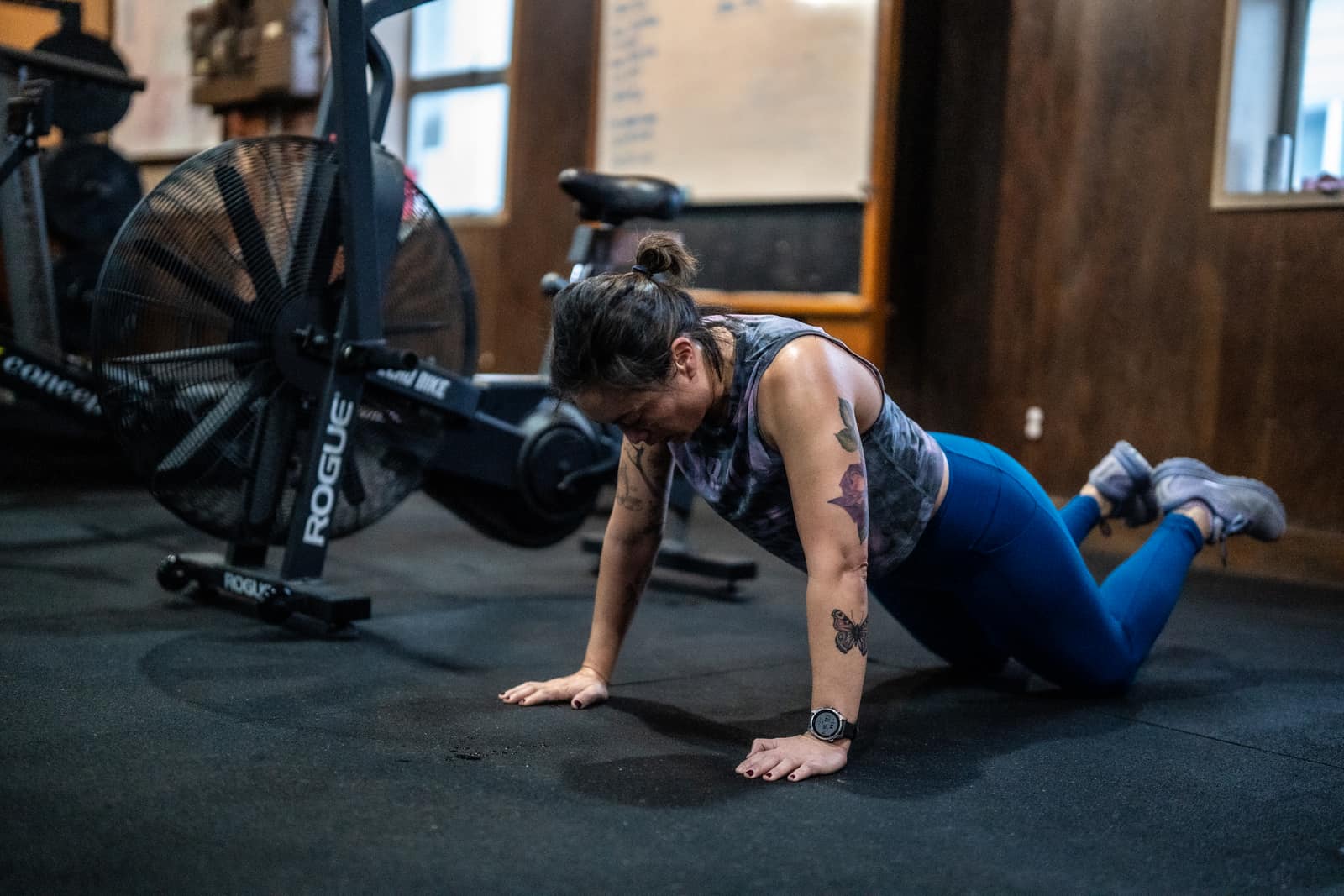 Member working through a set of pushups at Persistence Athletics, Belltown Seattle